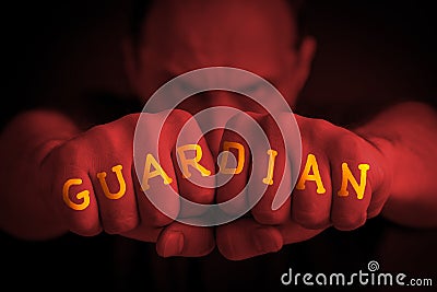 GUARDIAN written on an angry manâ€™s fists Stock Photo